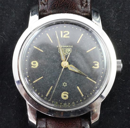 A gentlemans 1950s stainless steel Heuer automatic wrist watch,